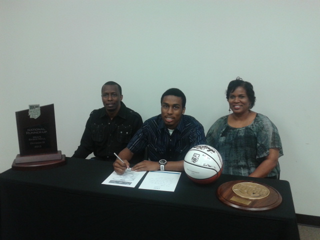Brock Hunter is pictured with his parents.